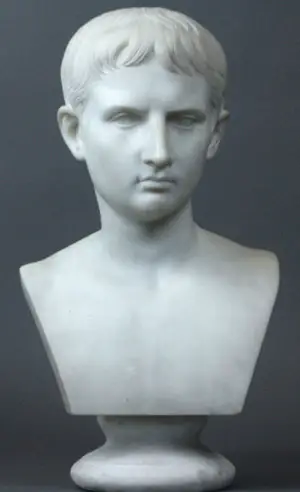 Busto italiano en mármol del siglo XIX representando a un joven Julio César. 