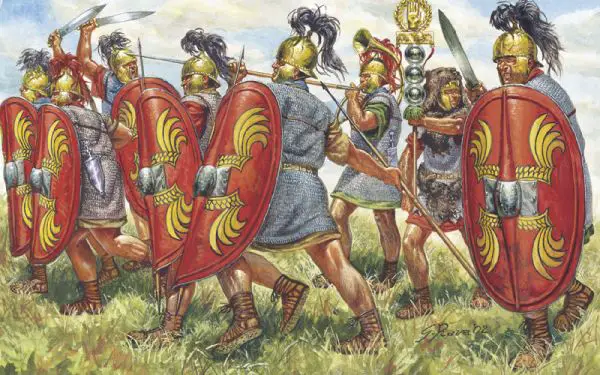 Antesignanos romanos luchando por delante del estandarte y protegiéndolo del enemigo.