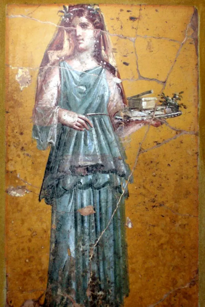 Fresco de una mujer romana utilizando un patagium.